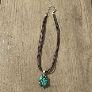 Silpada brown leather necklace with turquoise stone.